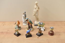 A Royal Crown Derby fine bone china Kingfisher marked XLII sold alongside a Royal Worcester fine