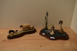 Two Border Fine Arts animal groups comprising 'Courting Grebes' model number WW3 and 'BlackFaced Ewe