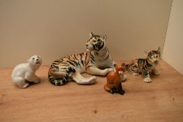 A group of four USSR porcelain animal studies comprising polar bear, fox and two tigers, largest