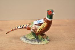 A John Beswick pottery Pheasant study, marking to underneath sold with box.