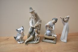 A group of four Lladro porcelain figures comprising 'Mendigo Begger' number 1094, 'Kneeling