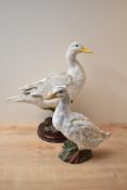 A Leonardo Collection porcelain duck study measuring 42cm tall sold alongside a similar porcelain