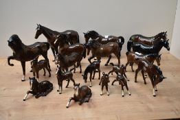 A group eighteen of Beswick Pottery horses and foals, all gloss finish.