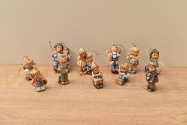 Ten Hummel Studio vintage porcelain Christmas tree decorations.