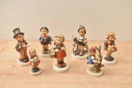 A group of seven Goebel porcelain figures and figurines comprising 'Apple Tree Girl' number 141, '