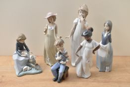 A group of six Nao by Lladro porcelain figures and figurines comprising 'Girl with Rabbits' number