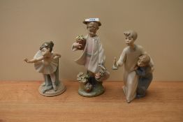 Three Lladro and Nao by Lladro porcelain figurines comprising 'Delicate Nature' number 8240, '