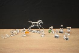 An assortment of small Swarovski Crystal animal studies to include Three Wise Men, owls and teddy