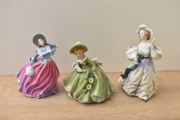 Two Royal Doulton bone china figurines Pretty Ladies series 'Autumn Breeze' HN 4716, 'Grand