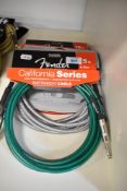 Four Fender 4.5metre instrument cables , Red, Green and two silver tweed (as new shop stock)