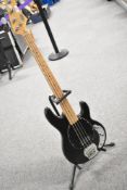 A Stag 'musicman' style bass guitar, sold with guitar stand
