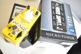An X Vive effects pedal, Lemon Squeezer V9 and V19 power supply