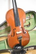 A traditional violin having one piece 14' back , in vintage fitted case, sold with two bows