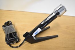 A vintage cased Grundig GM-313 desktop microphone