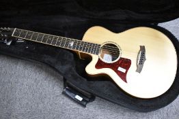 An as new Tanglewood 12 string model TW145 12 SS CE (left handed) , with fitted case , serial number