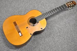 A vintage Harald Petersen classical concert guitar, sold with vinyl gig bag