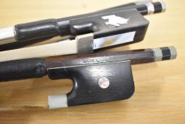 Four assorted cello bows including Knoll