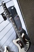 An early 1960s EKO white pearloid electric guitar, with soft gig bag