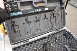 A Boss BCB-60 pedal board