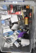 A box of various parts and accessories, mainly guitar related
