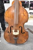 A traditional double bass , probably 19th Century , having one piece back, cant see label to