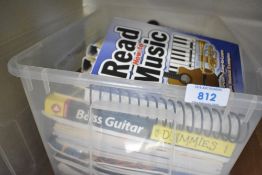 A box of assorted music tuition and reference books