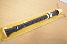 A Aulos 205 descant recorder , with sleeve