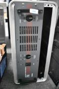 An Electrovoice 7300A power amplifier in flight case