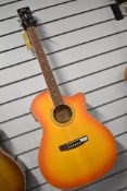 A modern Cort GA-MEDX electro acoustic guitar, in as new condition with tags, along with a