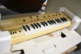 A vintage Casio MT-40 casiotone keyboard in original packaging
