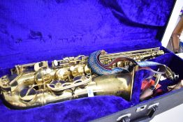 A traditional saxophone (tenor?) engraved DESIE, in fitted case