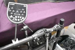 An Alesis electronic drum kit and accessories , including DM6 drum module