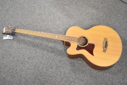 An as new Tanglewood electro acoustic bass guitar , left handed , model TW155A s/n YU140804043 (no