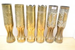 Two pairs of World war I brass Trench Art shell cases, British 18pounder and French 75DEC, the first