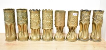 Four pairs of good World War I brass squat Trench Art shell cases, each with embossed foliate