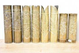 Four pairs of good French World War I 75DEC brass Trench Art shell cases, each with embossed foliate