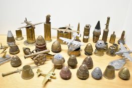 A collection of mixed World War I & II brass Trench art and associated remnants, to include