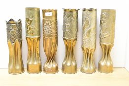 A group of five near matching French World War I 75DEC brass Trench Art shell cases, each with