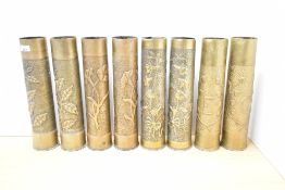 Four pairs of French World War I 75DEC Trench Art shell cases, each with stylised foliate decoration