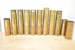 A fine pair of French 75DEC World War I Trench Art shell cases, having fine hand-engraved decoration