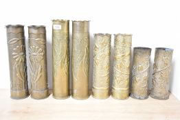 A good pair of French World War I brass 75DEC Trench Art shell cases, embossed and engraved with