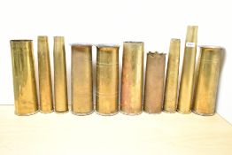 A group of ten French 75DEC, British 18 pounder and four 40mm brass shell cases, five having