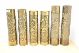 A good pair of French brass 75DEC Trench Art shell cases, decorated with pansies against a punched