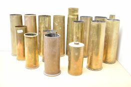 A group of mixed World War I & II brass shell cases, various sizes and origins, sixteen in total.