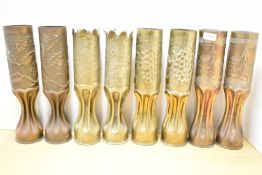 Four pairs of good French World War I 75DEC Trench Art shell cases, one pair decorated in the