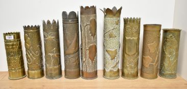 A group of nine French Brass World War I 75DEC Trench Art shell cases, seven having petalated