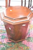 A 19th Century mahogany coal bucket/wine cellarette of octagonal form