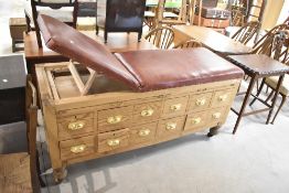 A tradtional doctors adjustable bed , with pine multi drawer base, length approx. 160cm