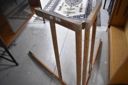 A vintage garment display frame, believed to be a Shetland sweater stretcher (jumper board)