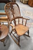 A 19th Century Windsor style rocking chair